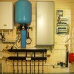 plumbing-services-plumbing-expansion-tank-heating-system-boiler-room_194017-3650